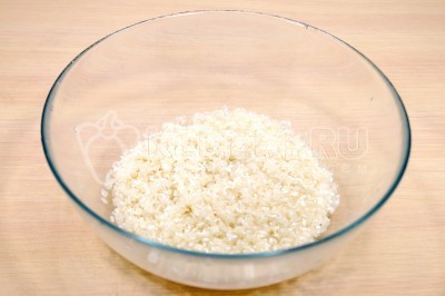Рисовая каша с тыквой на молоке в кастрюле